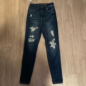 Dark blue ripped skinny jeans